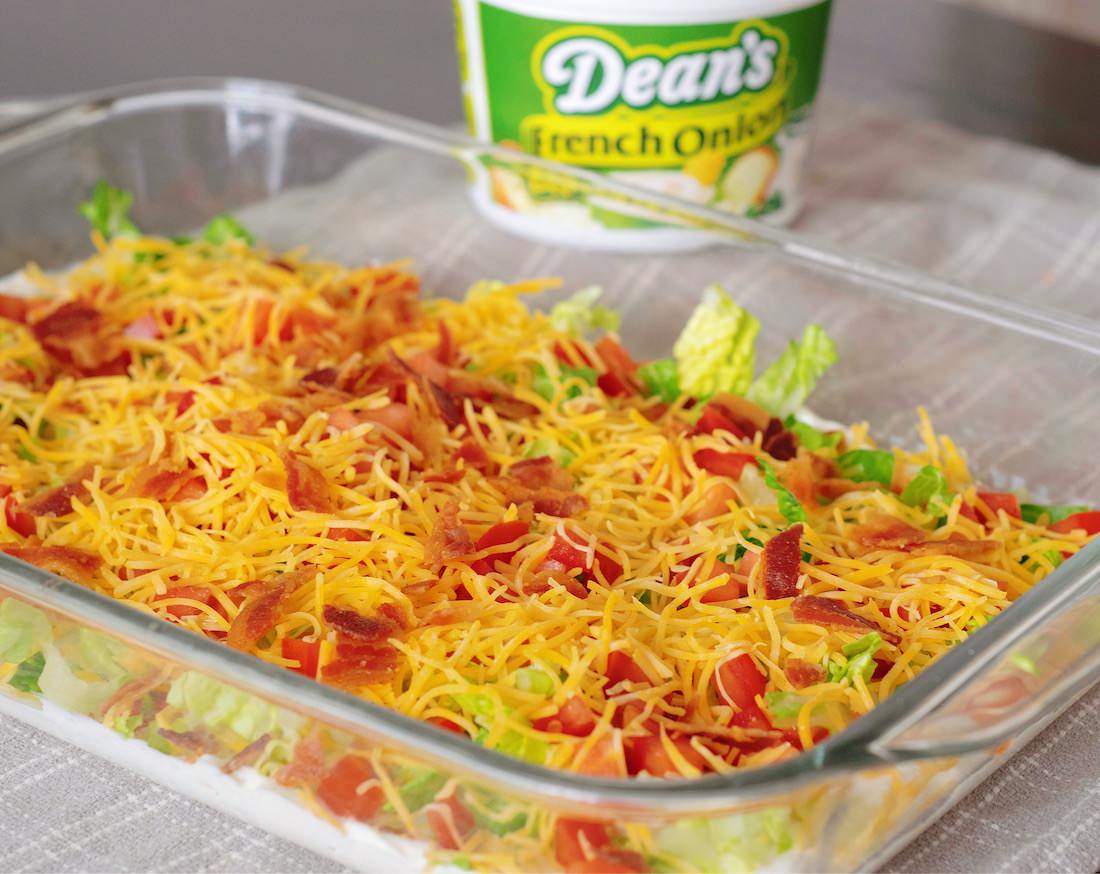 French Onion Layered BLT Dip Is made with Dean’s French Onion Dip.